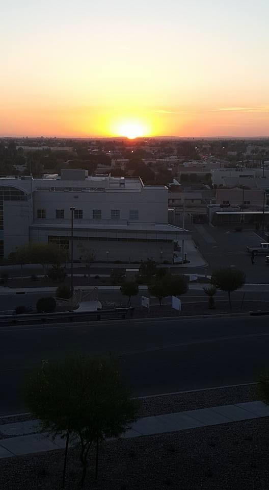 Here with Sis again.  We've been here for almost 5 hours. 
Sunset from the top of the parking garage.