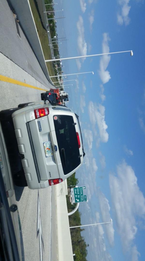 Florida car with WSU Shocker tag bracket.