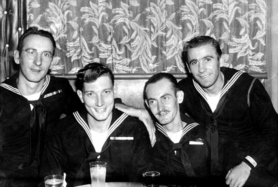 My Dad far right San Fran. Ca. On way home after WWII