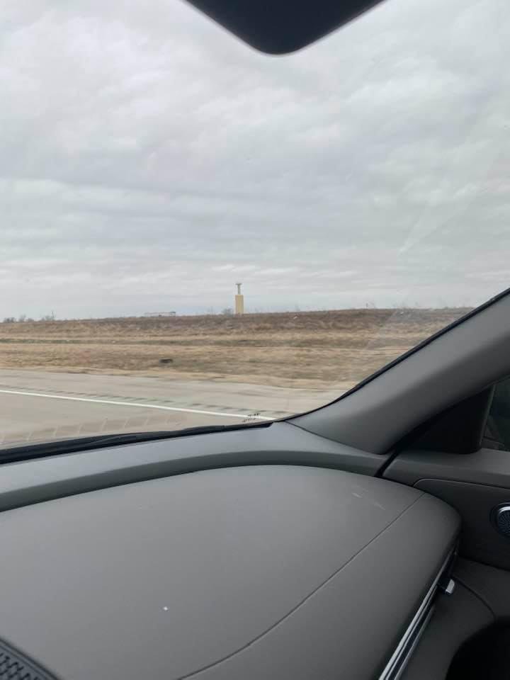 What the heck is this structure. Heading back from Dallas towards Austin, in field to the right just before or after Waco. Maybe 5G or a Frankenstein lab. Try zooming it to larger with your fingers or pressing for live pic.
