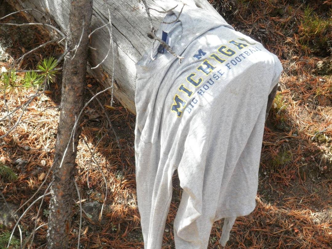 This shirt was draped over a dead tree next to the trail today. Somewhere in the Colorado wilderness there is a topless U of M fan! Michigan fans turn up everywhere!