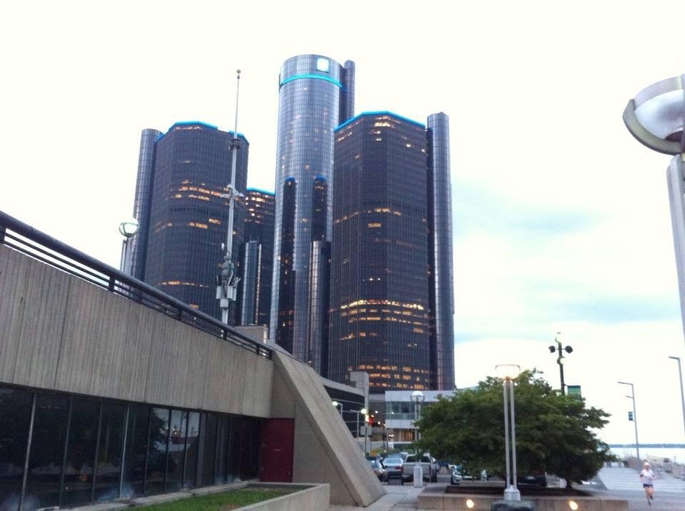 GM still has a presence in Detroit . The buildings house offices and plenty of cars as well as , it is waterfront property with a view of Canada across the river .