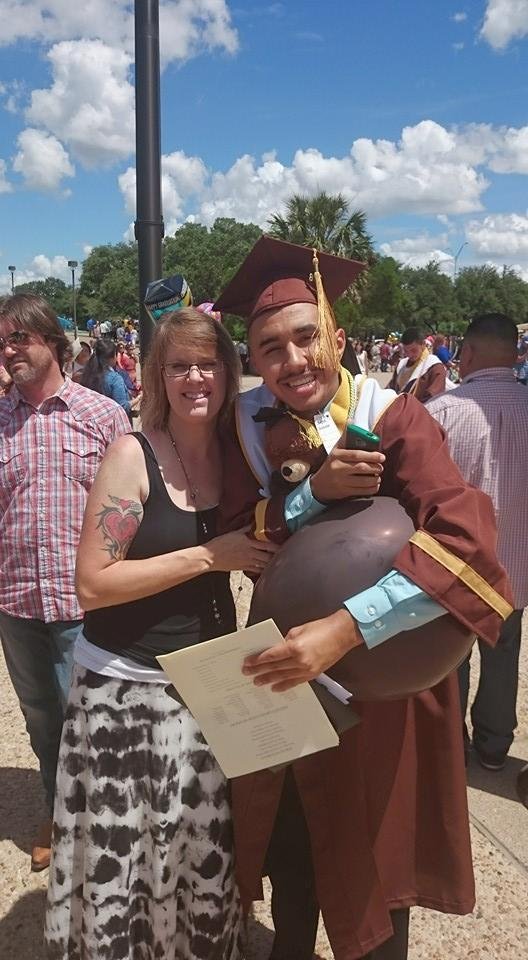 An aunt and her nephew, the last of the tri-fecta to Grad !!! SOOOOOOO proud of this guy, didn't see him long, but was WELL worth it !!!
