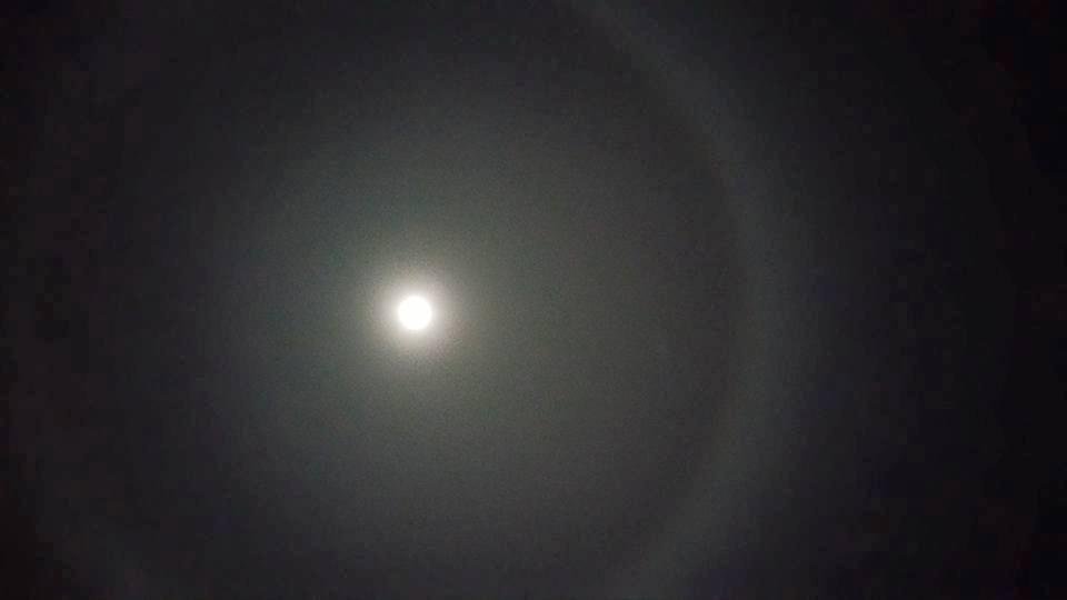 The moon has a giant ring around it tonight