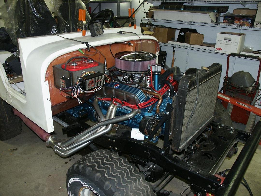 MY 73 CJ-5 JEEP WITH MY 304 CI ENGINE IN IT