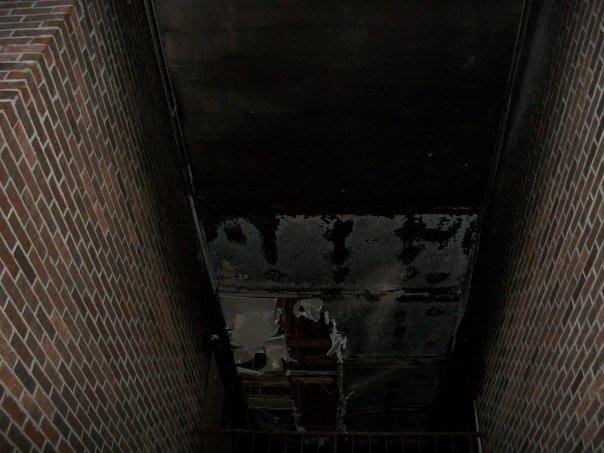 Upstairs Ceiling in Passage way Charred due too personel leaving burning apt. units door open. When encountering a burning room. Please close the door