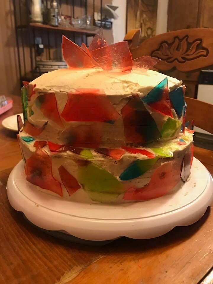 Week two of wedding cake trials this one is called stained glass cake my fiancé nailed it can’t wait for next weekends lol