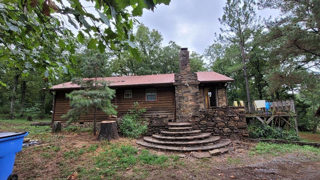 ALWAYS LOVE OUR LITTLE CABIN IN THE WOODS!!!
HAD BIG, DEAD TREE REMOVED TODAY THANKS TO SON #1 PAUL.
LOOKS A LOT BETTER!!!