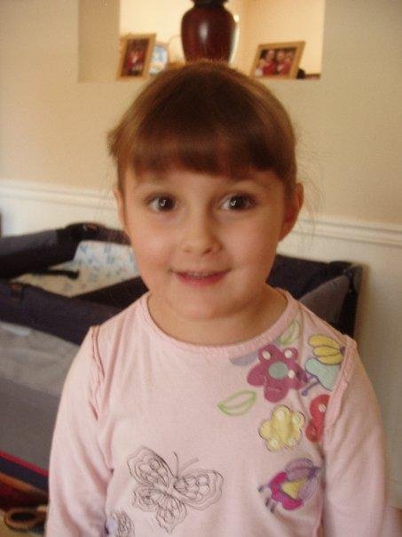 Laura, happy to be a big sister to 2 brothers