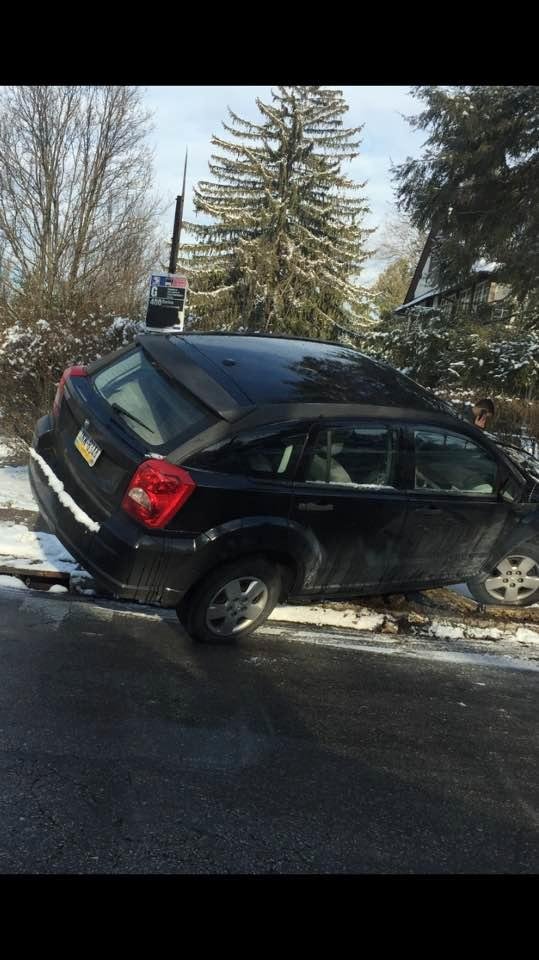 So my work sends me to Overbrook n South Philly where the streets are a sheet of ice. This guy's up on a fire hydrant