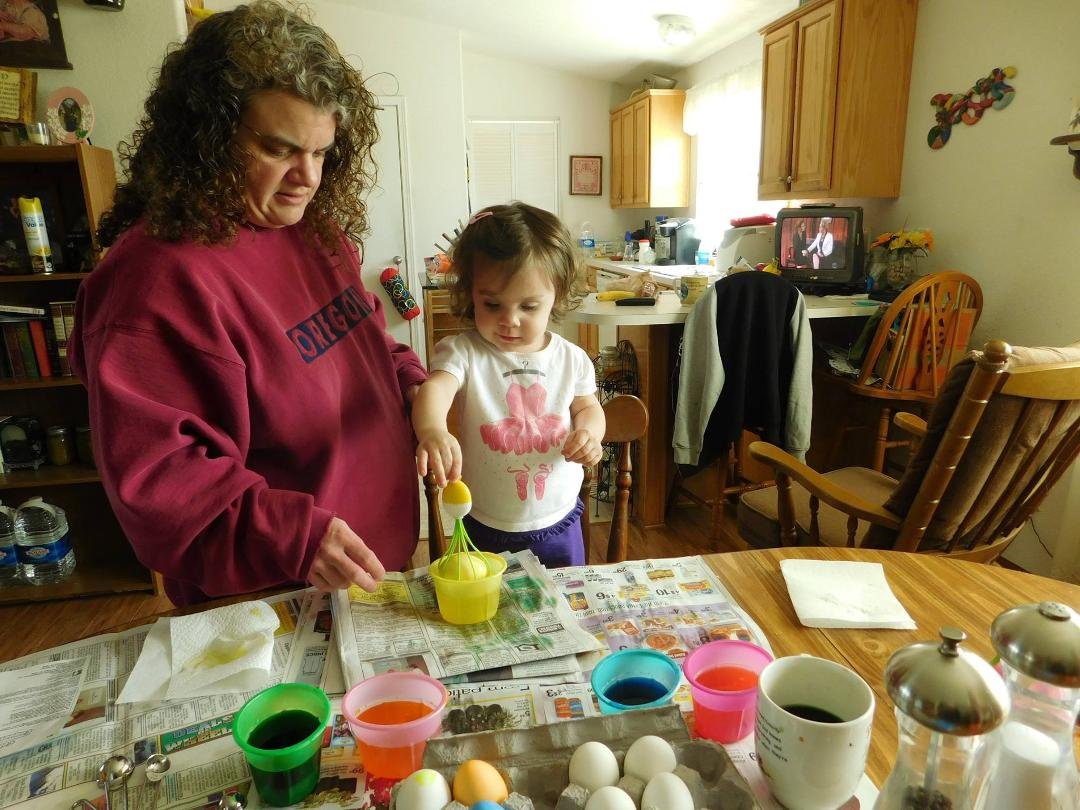Coloring Easter eggs.