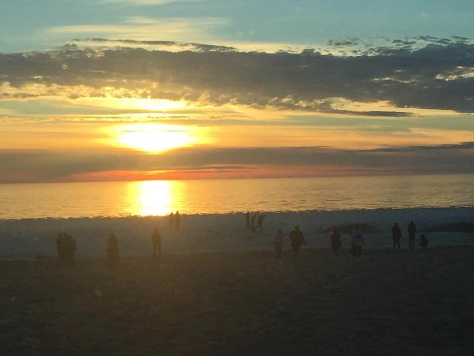 At the beach with my beautiful wife and an awesome sunset. I'm one lucky guy.