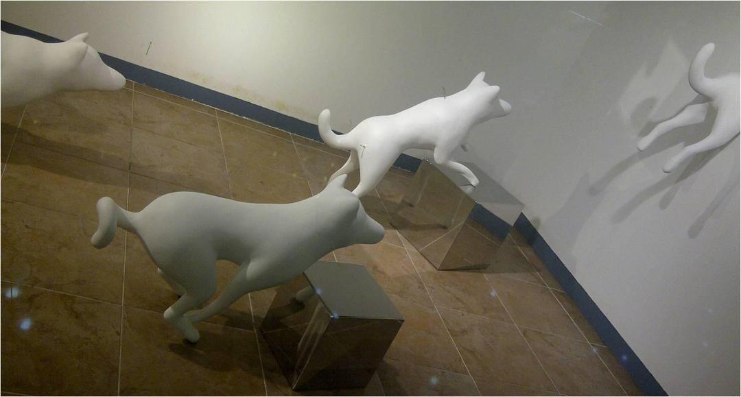 Are these pigs? One has a curly tail.