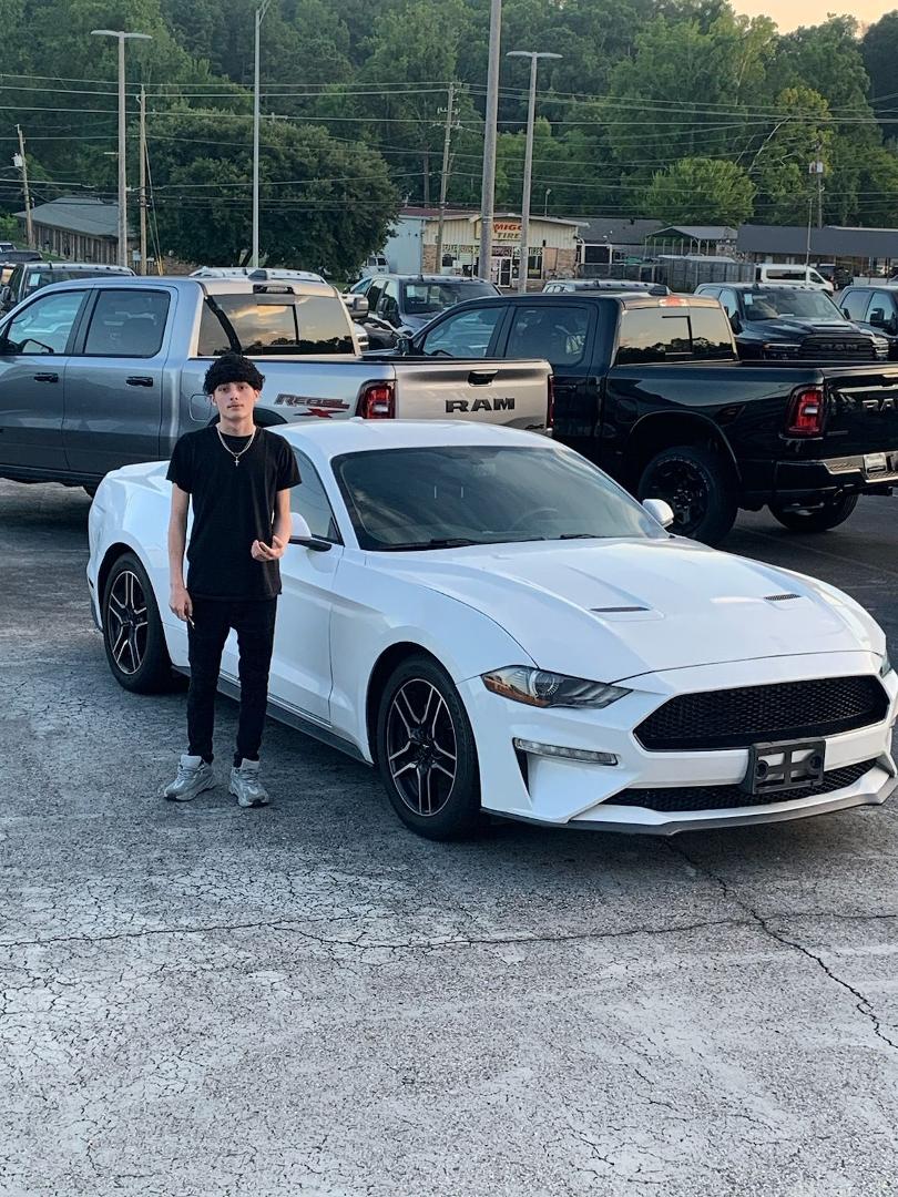 My grandson Jordan and his first car!!!