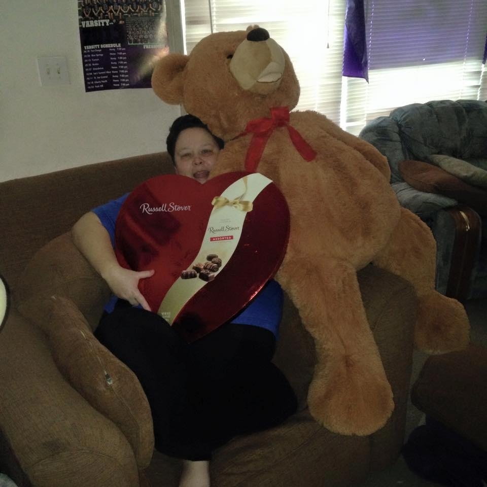Melinda and her candy heart with Elle's bear