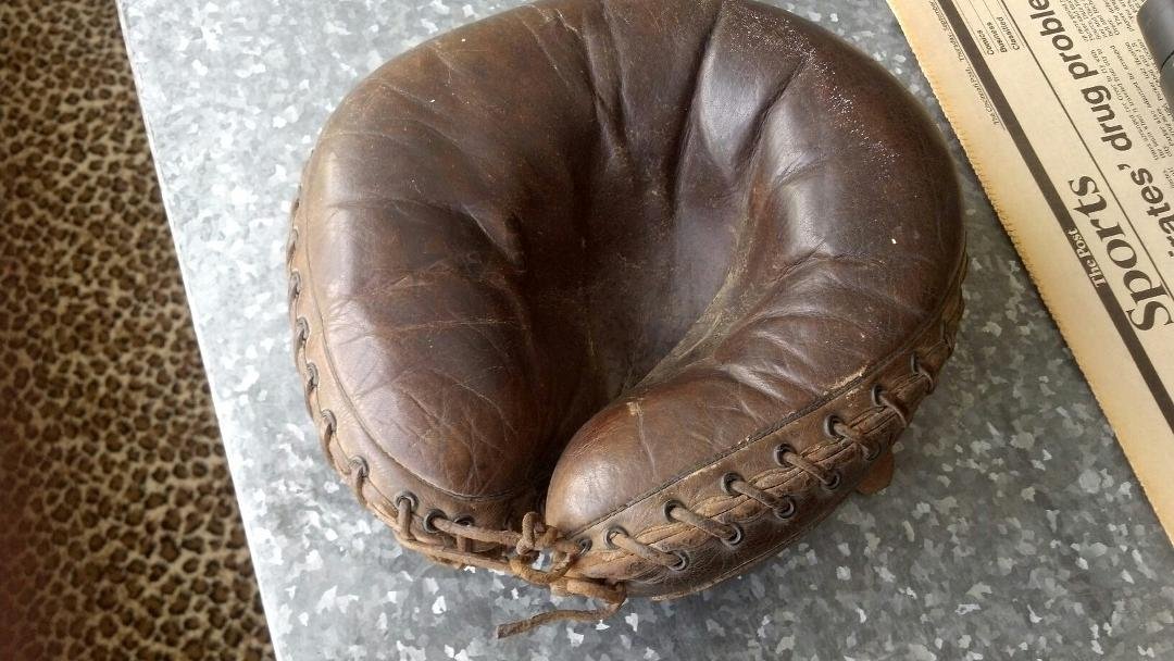 Does anyone have any idea what a catchers mitt that was bought in 1907 is worth. In excellent condition