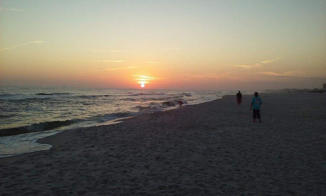Sunset in Gulf Shores, AL with Mary Milam, Greg Milam, Valerie Pogeman, and Bill Pogeman.