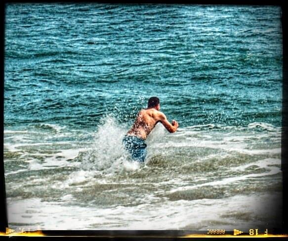 With a retouch by John Frazier, Doug hits the surf.