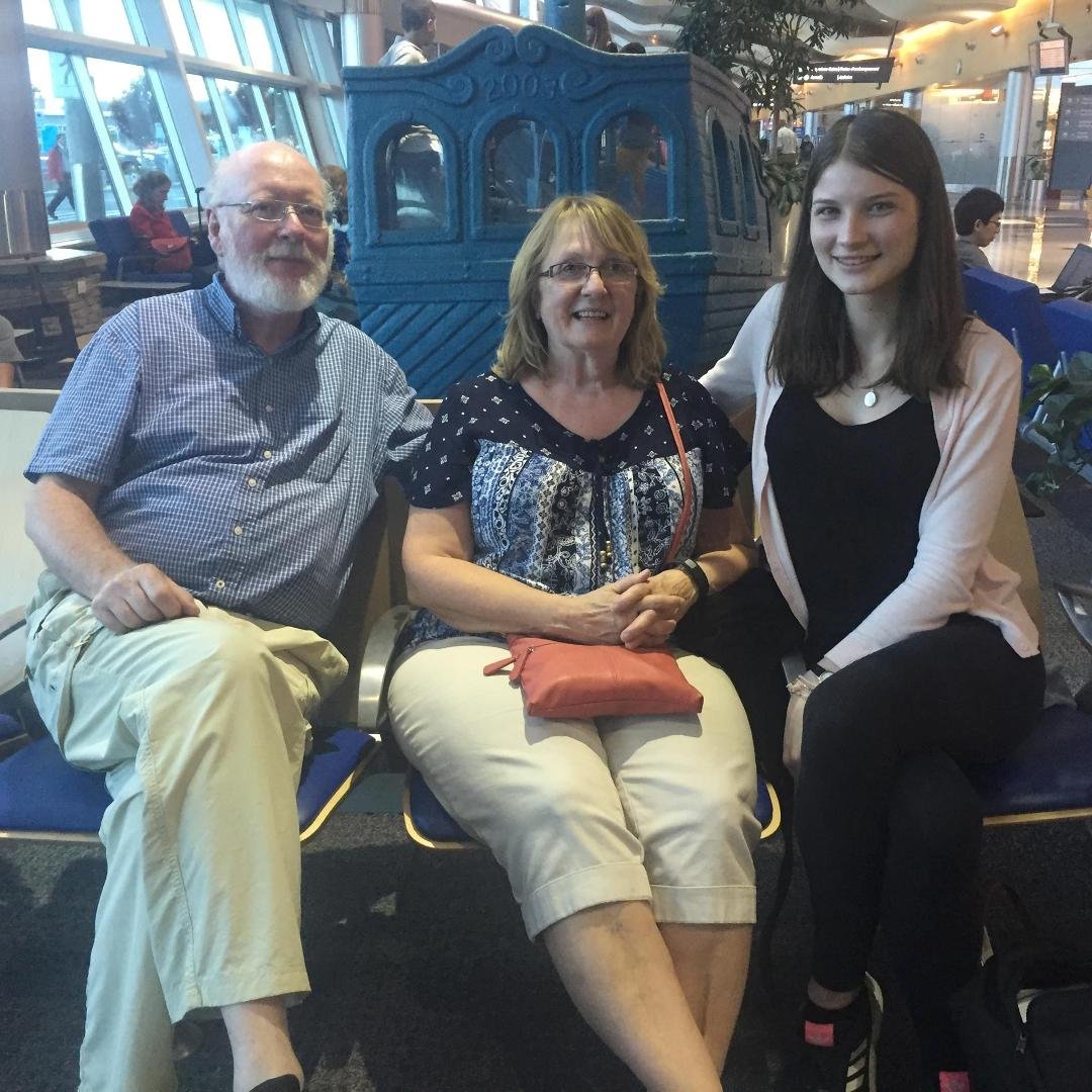 Mike and Wanda bring Nora to the airport to see her off on her trip home to Germany.