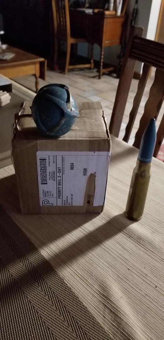 Got this in the mail - I ordered it. It is an inert version of the bomblets of a cluster bomb commonly carried in Vietnan. Was very effective against targets like missile sites
Next to it is the 20mm round the F-4 carri