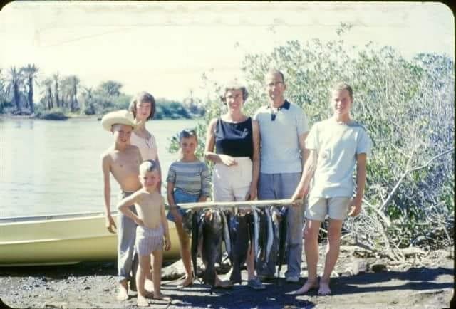 April 1961- Our year in Mulegé,Baja, Mexico.
Here we 5 Thomson kids are, with our daily catch right out of that river, behind us. We lived across from that river. Btw,we lived 100% off every grid you can imagine: no elec,n