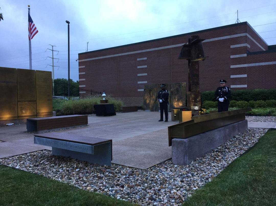 Went to the 911 memorial service this morning in Overlland Park, Ks. The sun came out just in time to put a shadow from the girder from the twin towers on to the medialion on the timeline