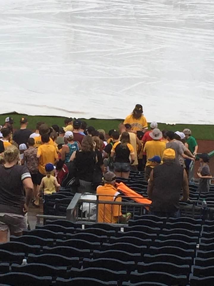 Zack's down there hoping to get his glove, hat & ball signed