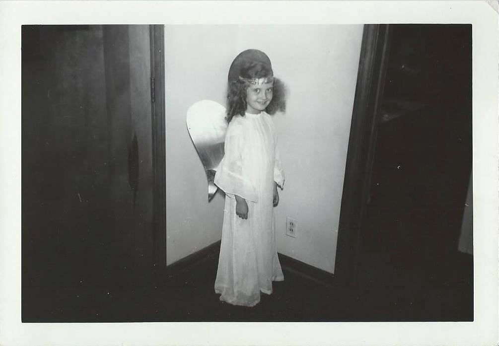 It's that time of year: Here I was, in second grade at Jerome School in Saginaw. I was in the Christmas pageant and as an angel, I got to sing "Away In A Manger". (Please note, there were no requests for me to ever sing aga