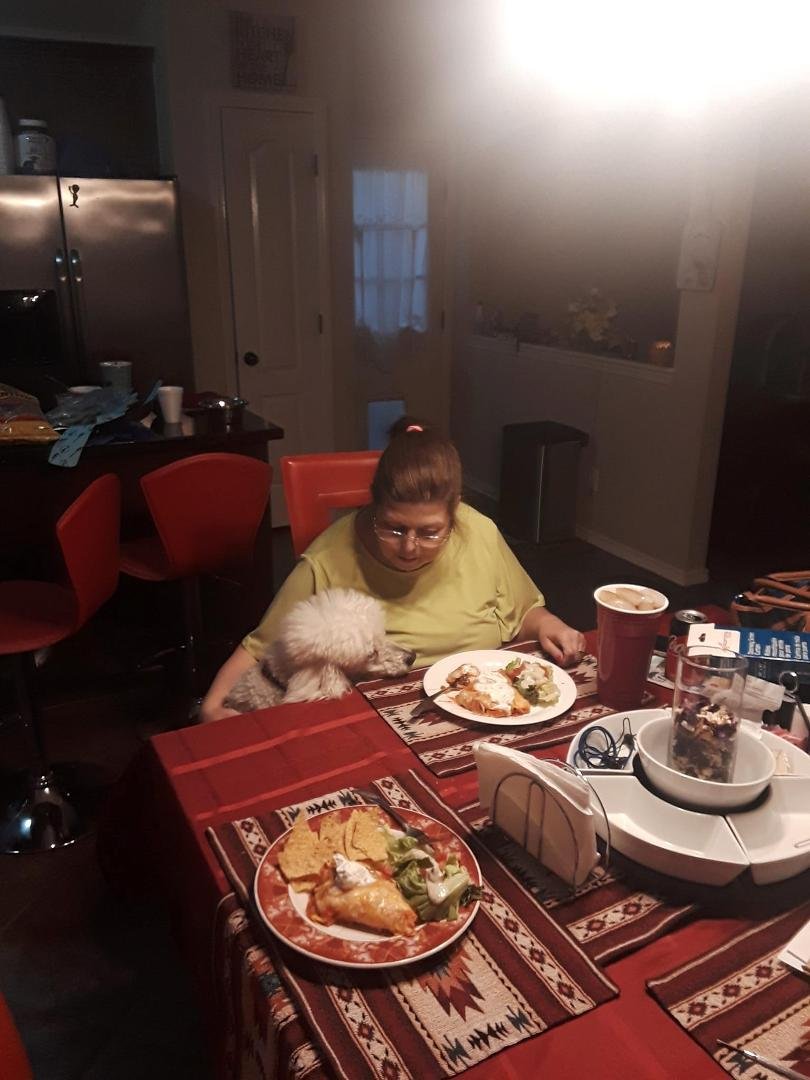 Doug Johnson helped me make red enchiladas tonight. Of course, Peanut wanted some. So proud of Doug--He only started 3 small fires while cooking!