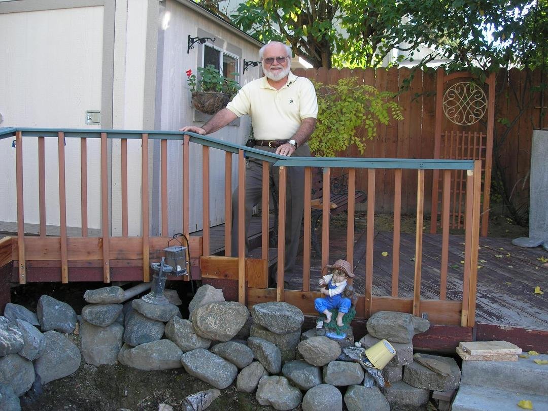 Myself standing by and unfinished Rail over seeing a purposed Mini Pond.