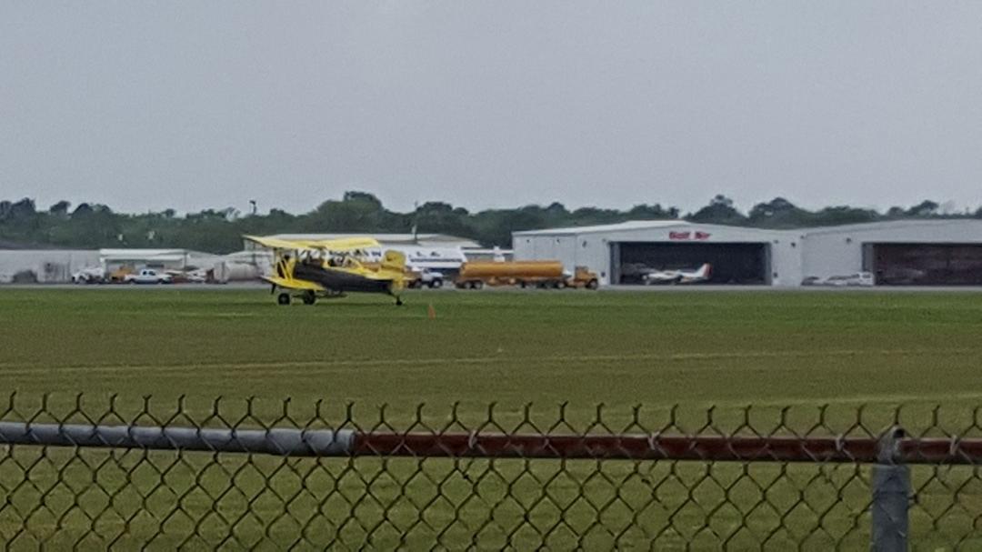 Runway? We don't need no steenkin runway! Grass is what this Ag Tractor likes, at least for landing! Less than a minute later he's reloaded and taking off.