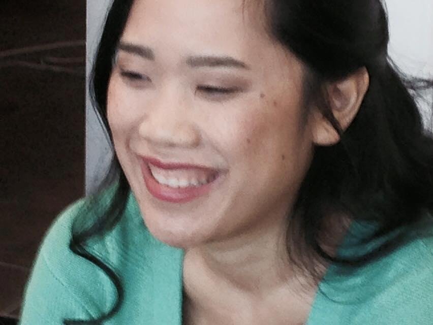 OMG. Linh is smiling!