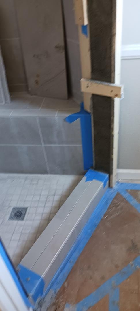 Repairs that Christi Galla had to do. The repairs to the Master Bathroom that needed to be done to install a glass door in the shower