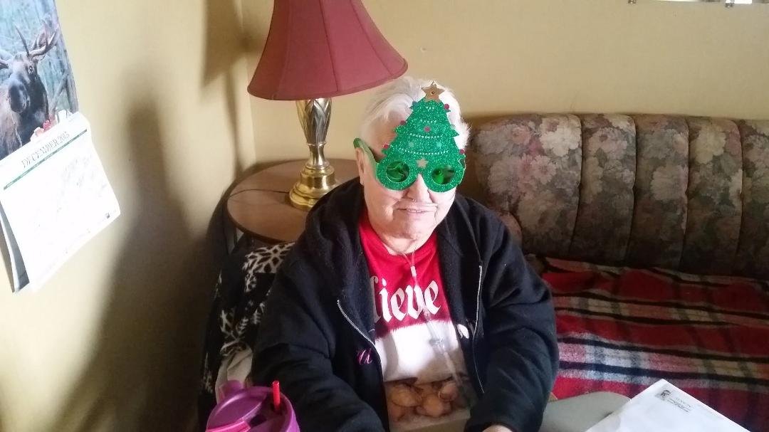 our living room with me featured in christmas card glasses sent by ken's niece from portland oregon.