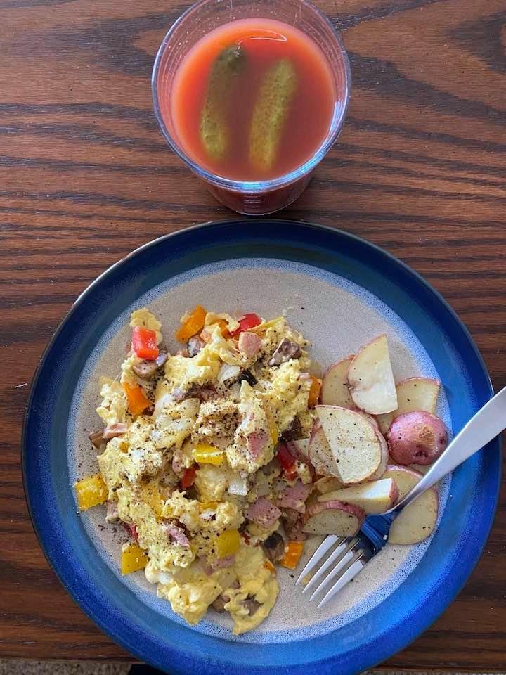 Sunday funday eggs potatoes and a bloody cheers to all have a great day
