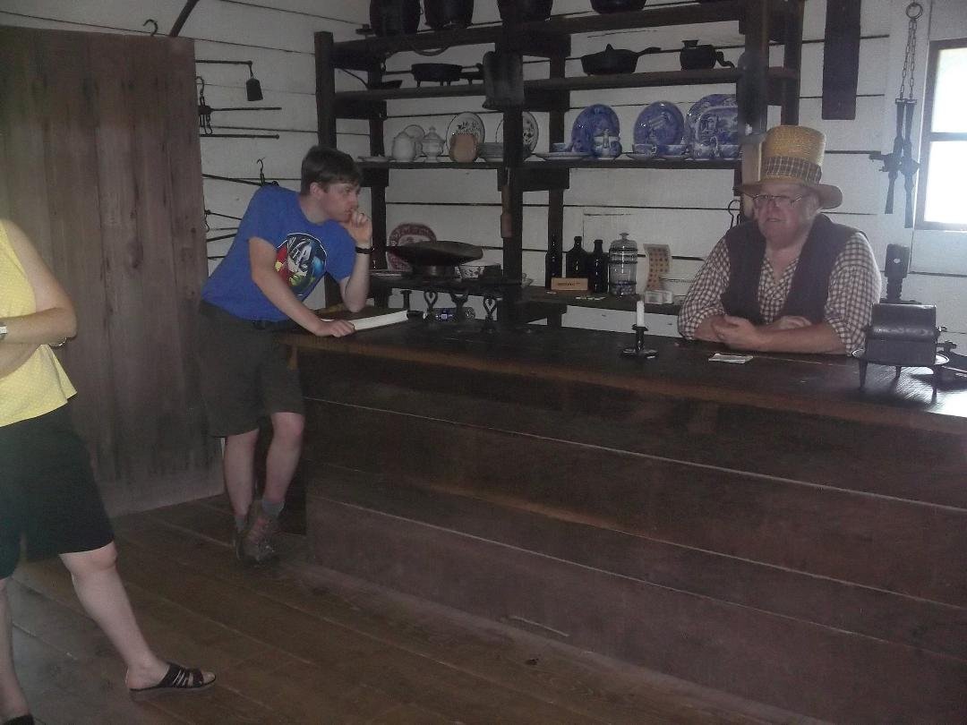 Jeff listening to the man talk about the New Salem Country Store/Post Office.