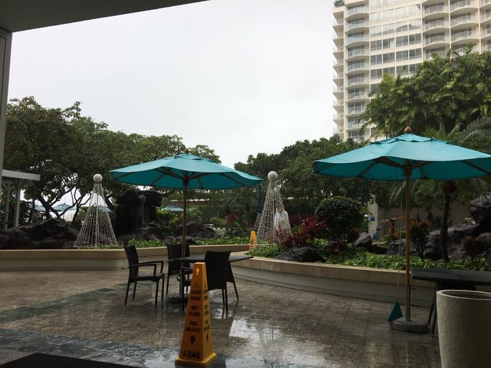 Having a latte watching the rain looking out from our table at the condo.
