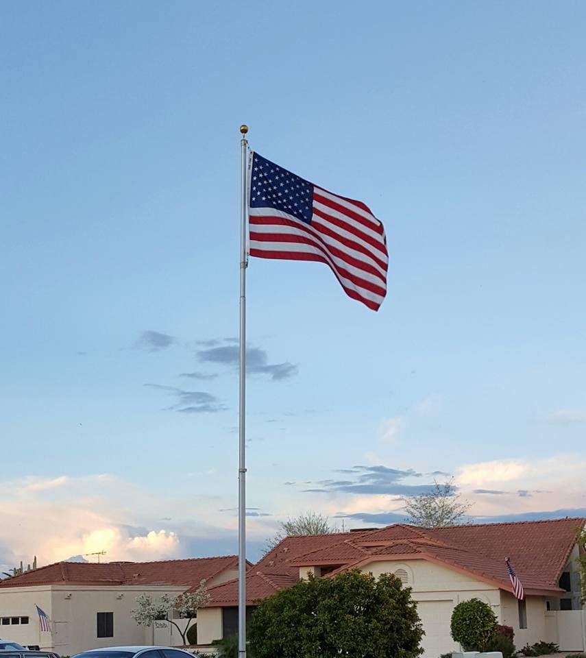Flying in memory of all who served. My flag is in my front yard on a street that the majority of my neighbors also proudly display their patriotism by flying the American Flag.