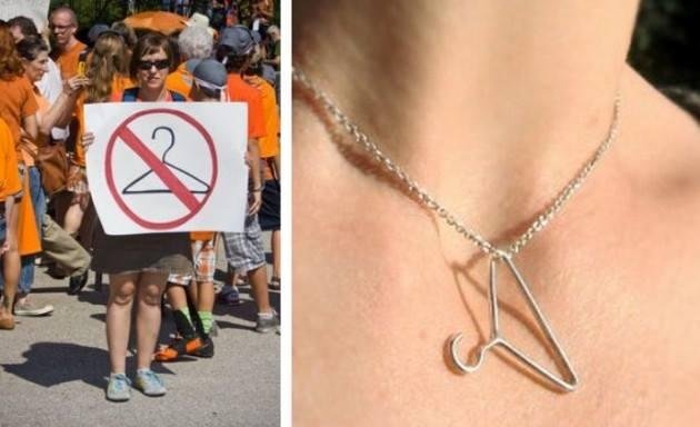Here is the ultimate expression of crass insensitivity. It is the perfect gift for the woman who not only scoffs at the sanctity of life but wears her politics on “her sleeve.” It is a coat hanger pendant, and it can be her