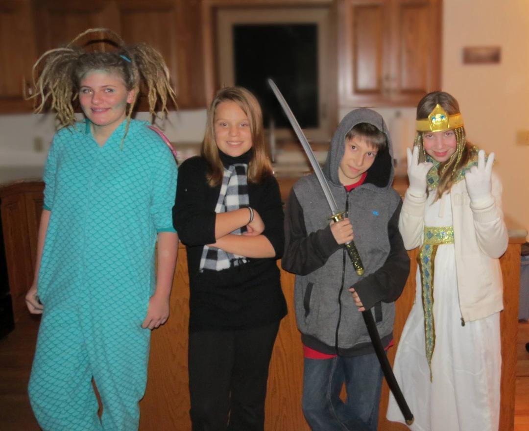 Our 3 grandkids (right to left: Jade, Ayzik, and Isara) and Jade's friend DJ (far left)