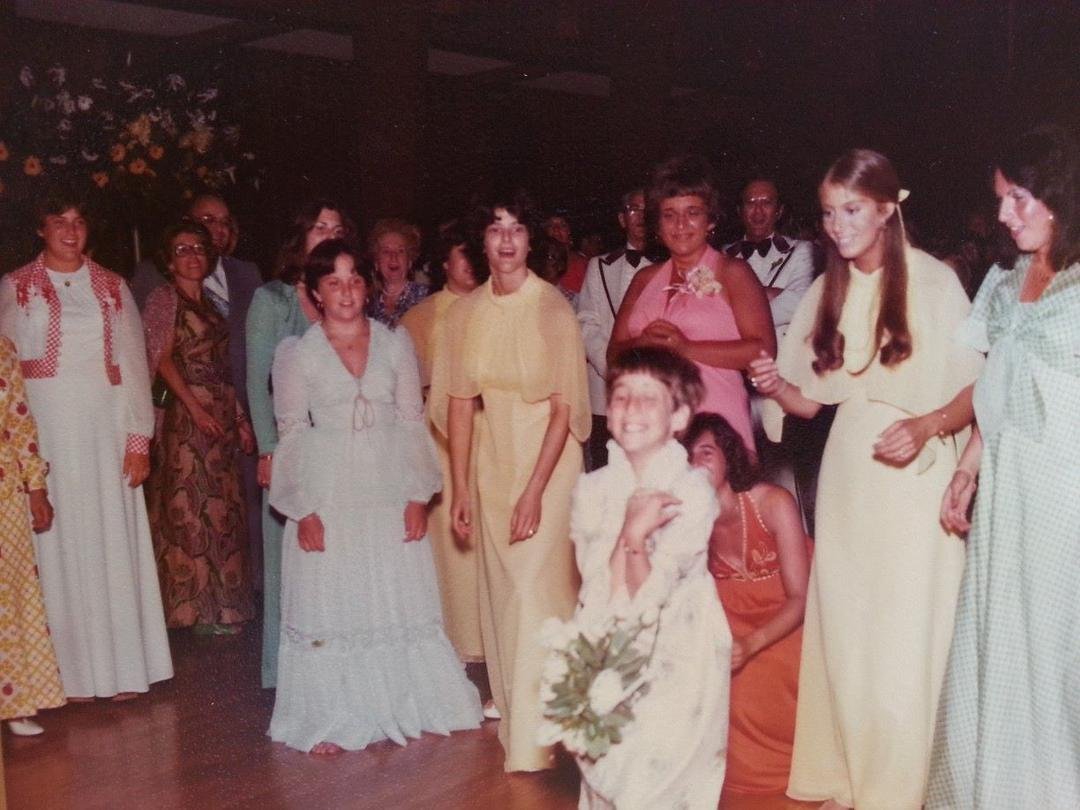 Not at all sure why my 'little' cousins were 'allowed' to participate in the throwing of the bouquet, but look who almost caught it!