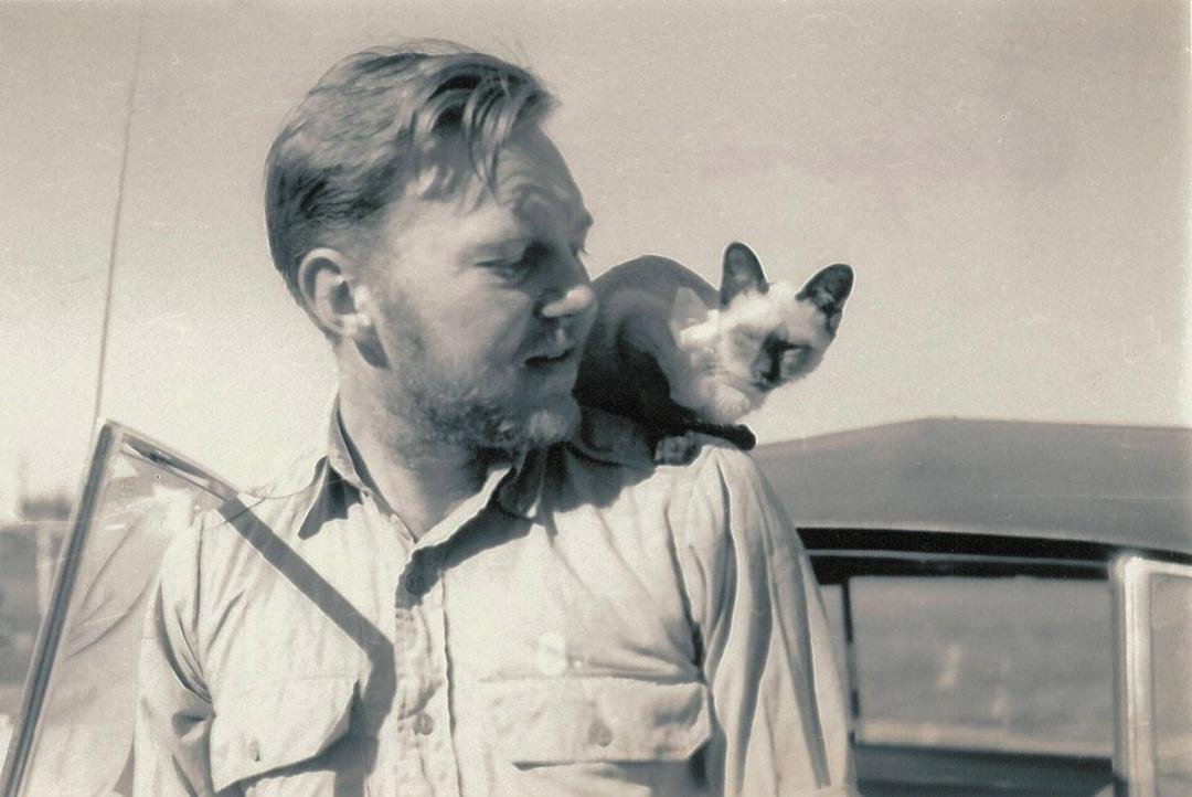My dad, with our cat Ming Mau, was taken between serving in Japan and then Germany. Until my mom had shown the photo to me, some years back, I never had known my dad to have a beard. Great photo. Not sure where it was taken