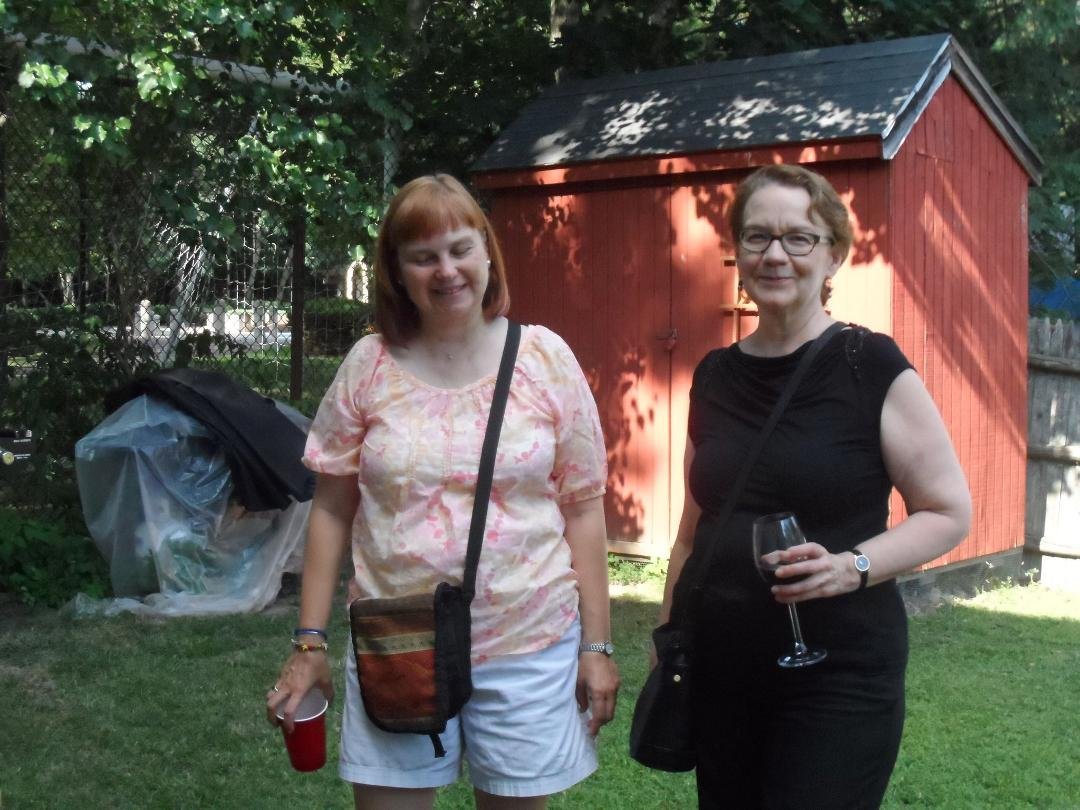 Miriam and Laura in Chuck,s backyard..