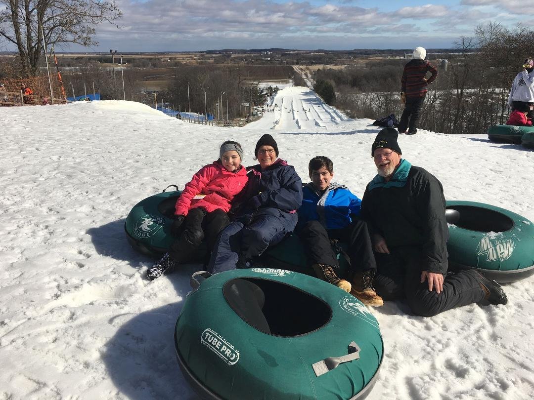 Tubing with Kaden & Marin. Some kids were in t-shirts it's so warm.