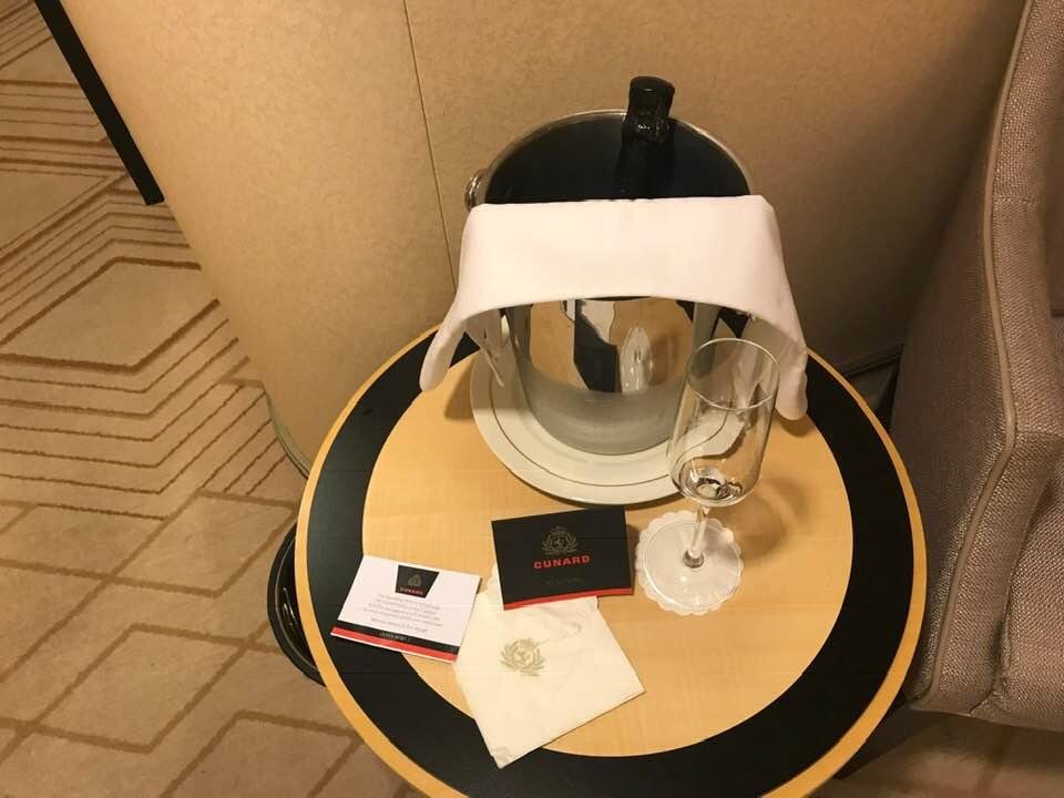 A nice bottle of sparkling wine greets me in my stateroom aboard the Queen Mary 2 in Brooklyn.
