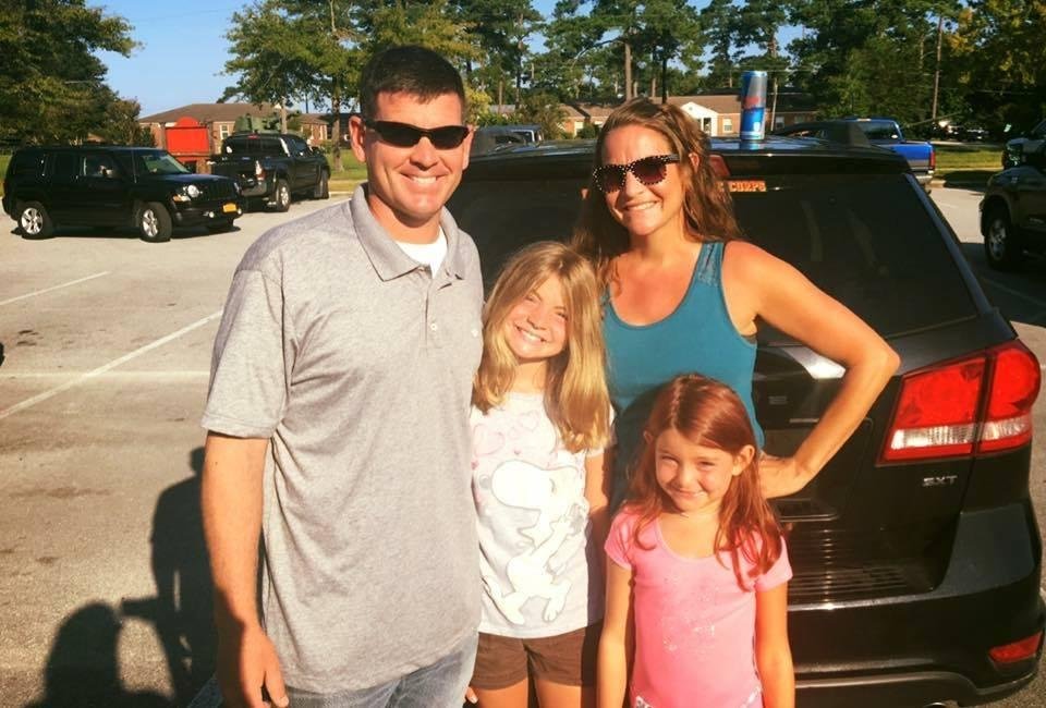 Dustin with his beautiful wife, Kaci, and beautiful daughters, Reagan and Payton. This photo was taken this morning before Dustin boarded the bus taking the men to Baltimore, MD before heading overseas.
