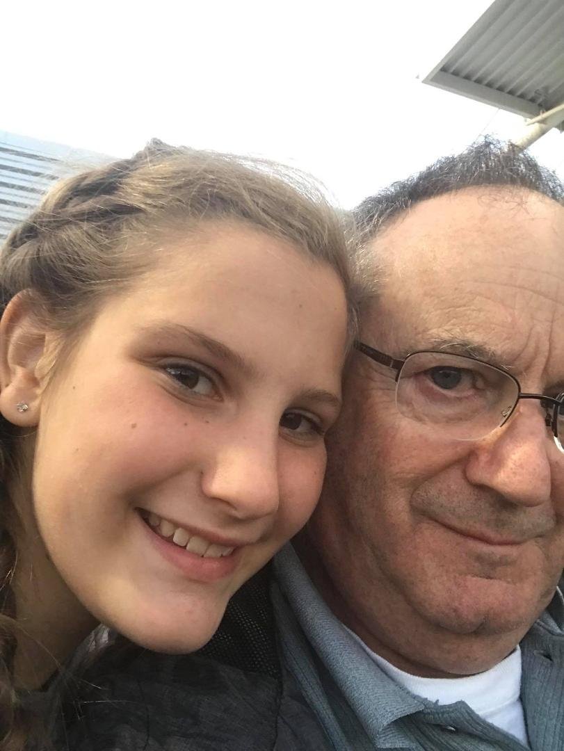 Natalia and grandpa at Hillsboro Hops baseball game.