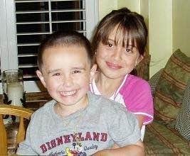 A rare photo of Jack smiling. Now one is a Senior and the other in 8th grade. Going by too fast.