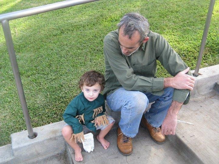 Zachary and his father having a juice break.,