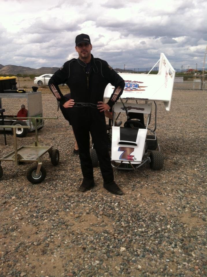 Same stance as ANTMAN
Who is that race car driver?